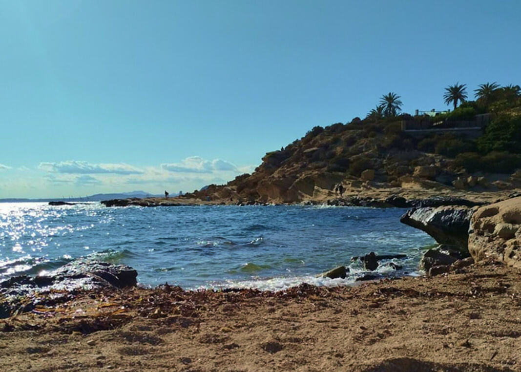 Rocky coves of Cabo de la Huerta with clear water