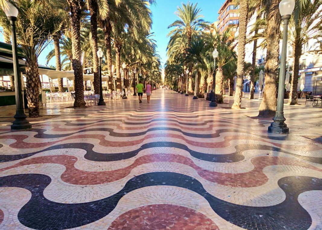 Explanada de Espana promenade with mosaics and palm trees in Alicante